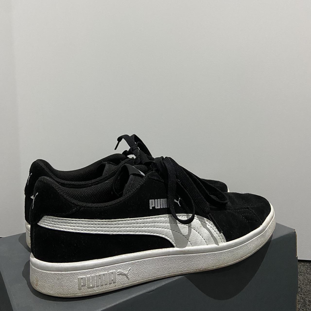 black and white pumas