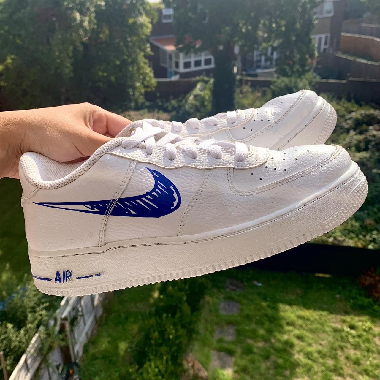 White nike trainers blue orders tick