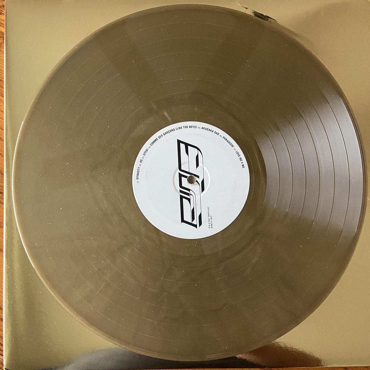 rina sawayama deluxe - gold glitter pressing has a... - Depop