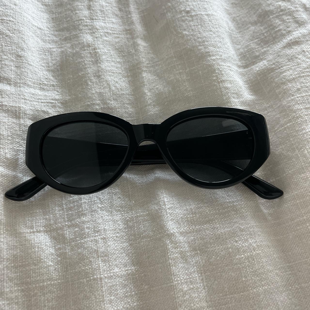 Plain black plastic sunglasses from target. It’s a... Depop