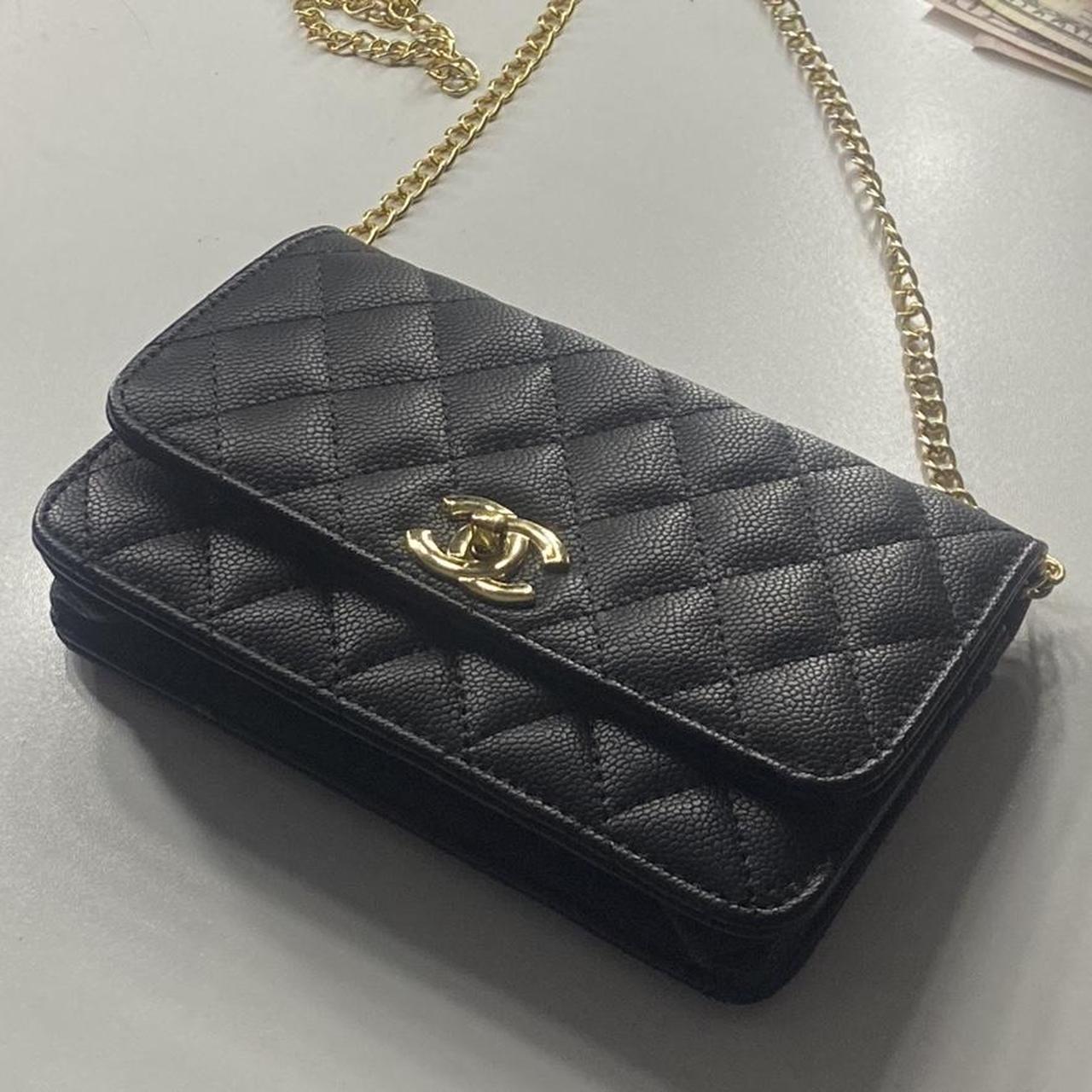 Chanel Women's Gold and Black Bag | Depop