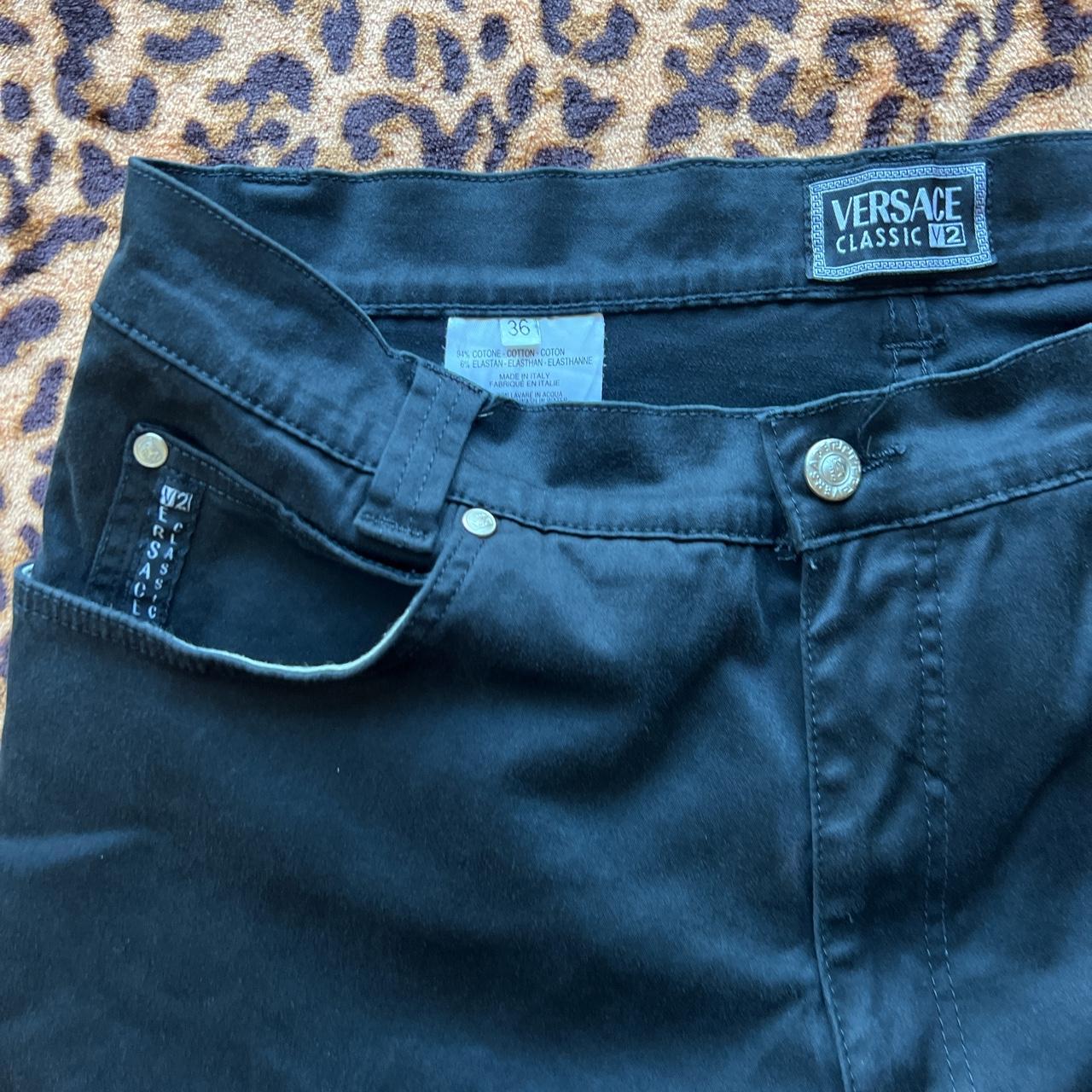 Versace waxed denim jeans Size 36 Fits true to... - Depop