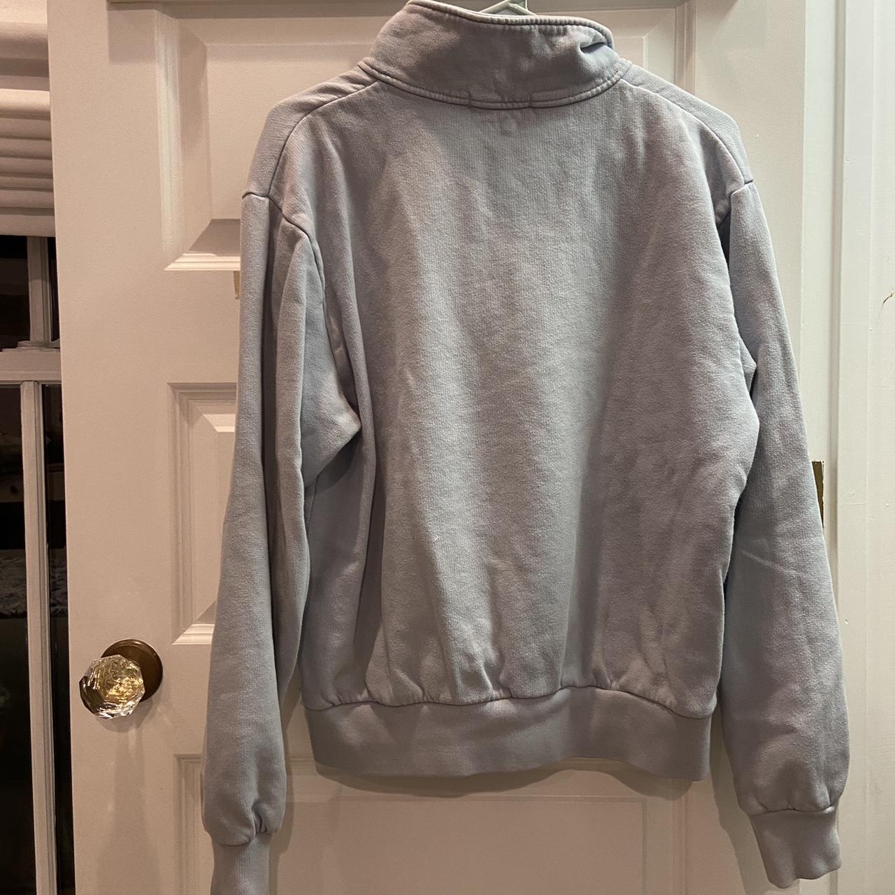Brandy Melville light blue quarter zip pullover.... Depop