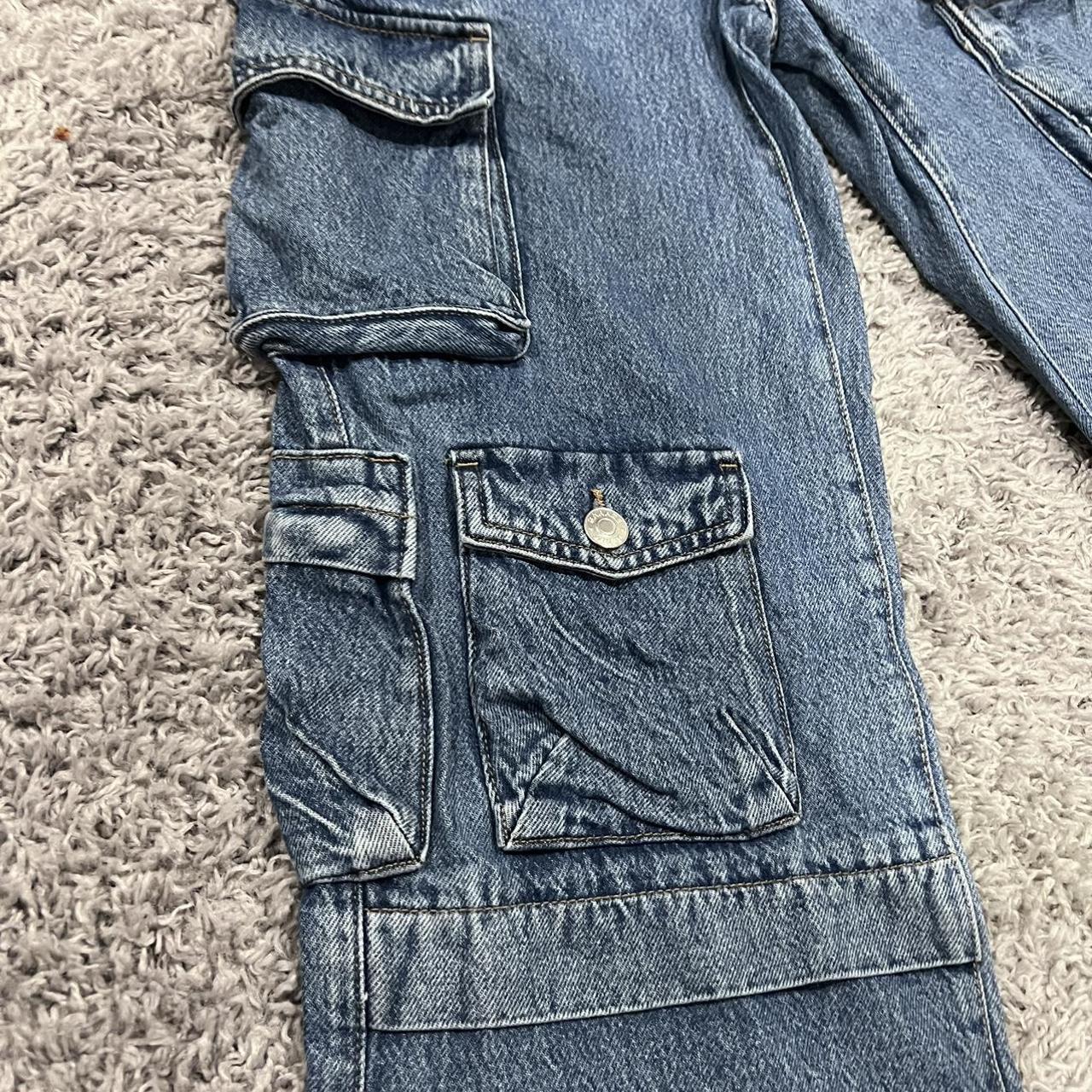 garage baggy cargo jeans low rise + medium wash... Depop