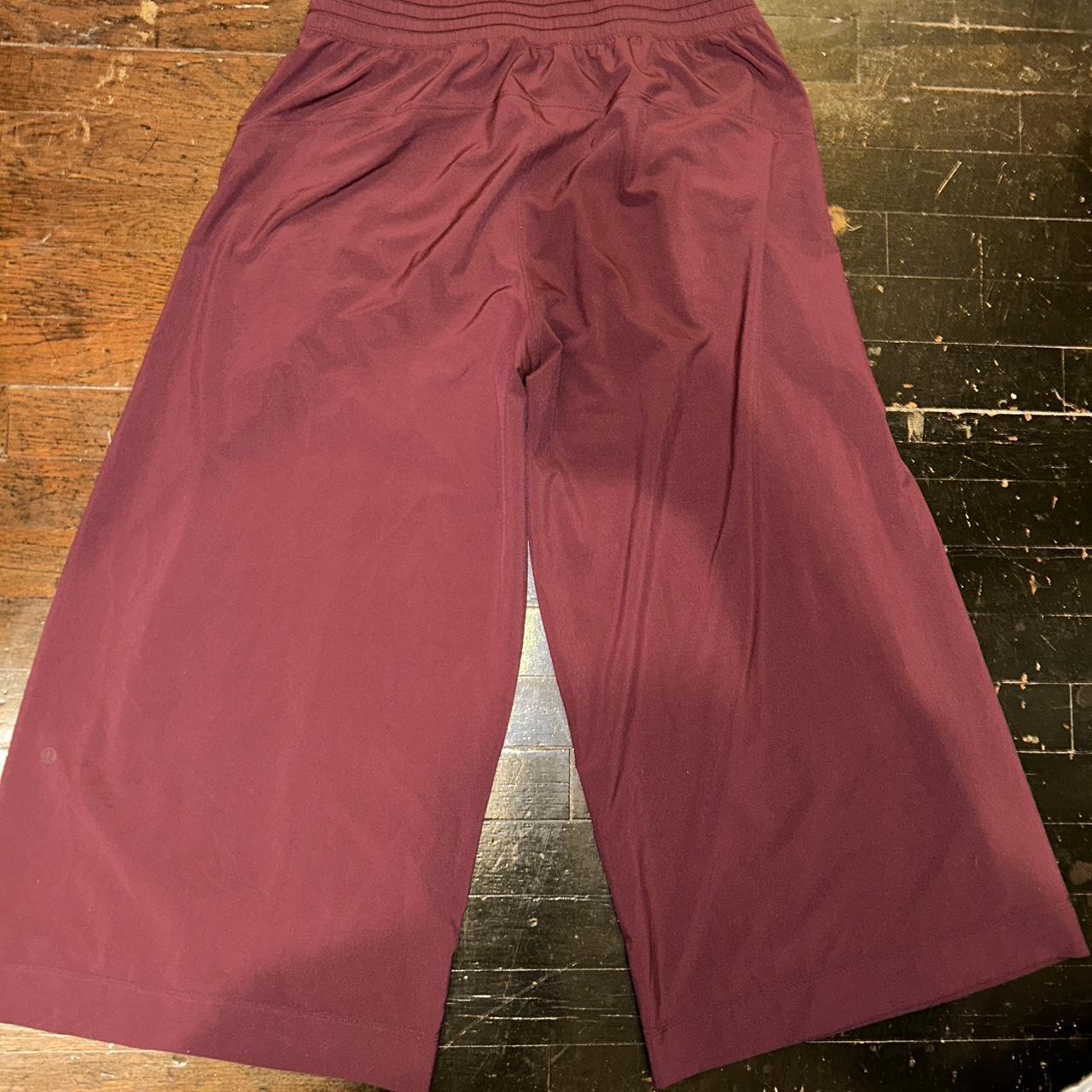 lululemon burgundy wide leg track pants size - Depop
