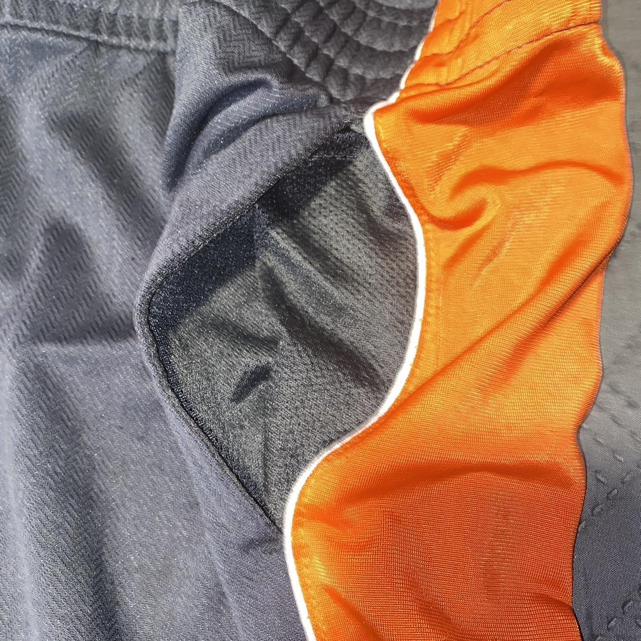 Vintage orange and grey starter shorts, size large.... - Depop