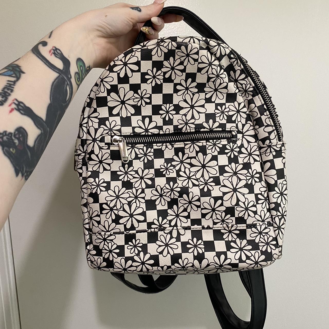 black white checkered mini backpack with flower. Depop