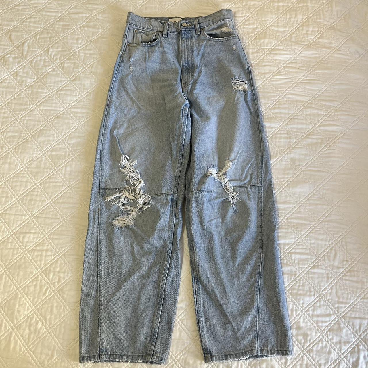 super high rise and baggy light wash jeans with rips... - Depop