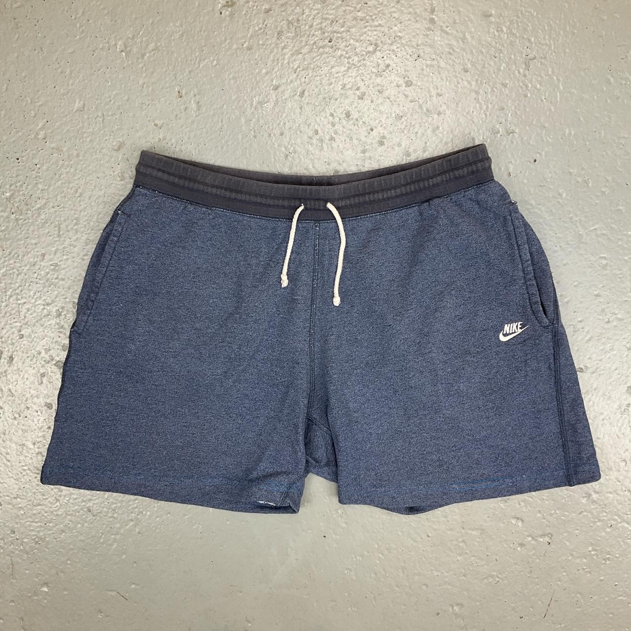 Y2K Nike sweatpants shorts in a blue m ark with Depop