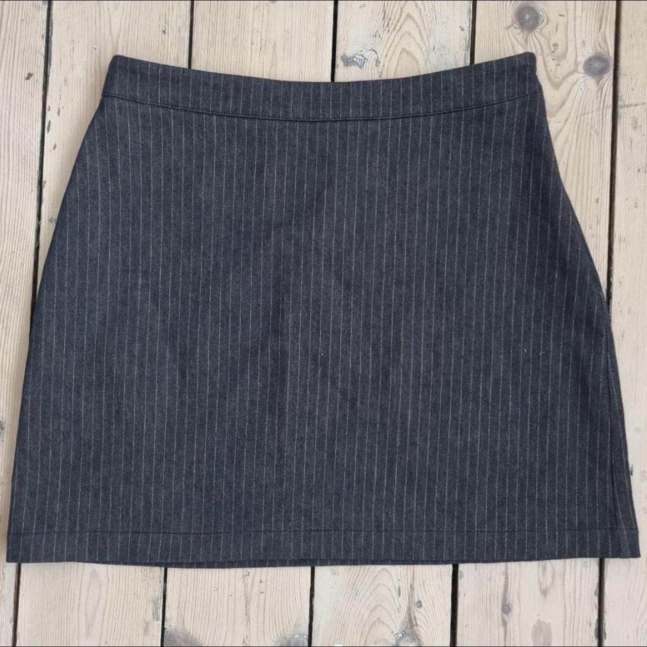 dark blue pinstripe mini skirt from Urban... - Depop