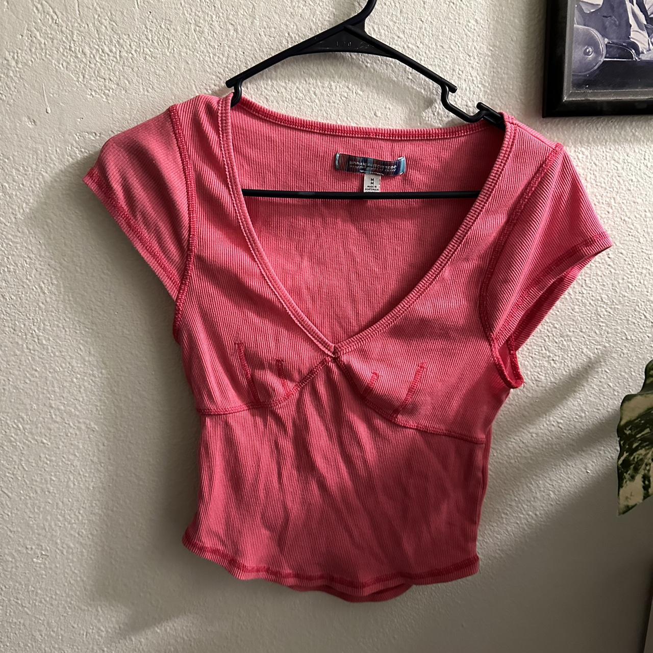 Pink Urban Top Size medium but runs... Depop