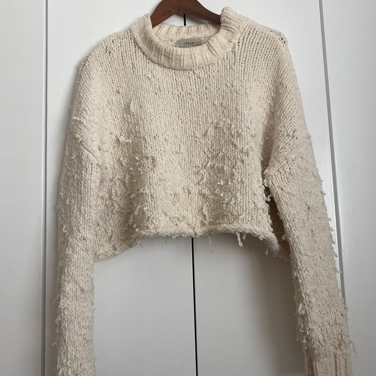 distressed sweater. urban outfitters, size S but can...