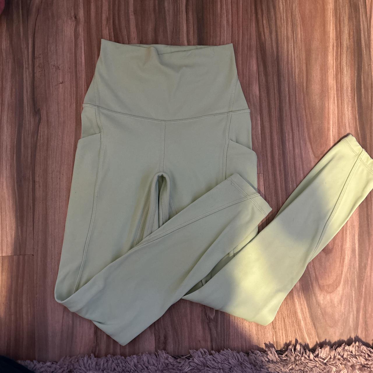 Mint green LULULEMON leggings with pockets signs of. Depop