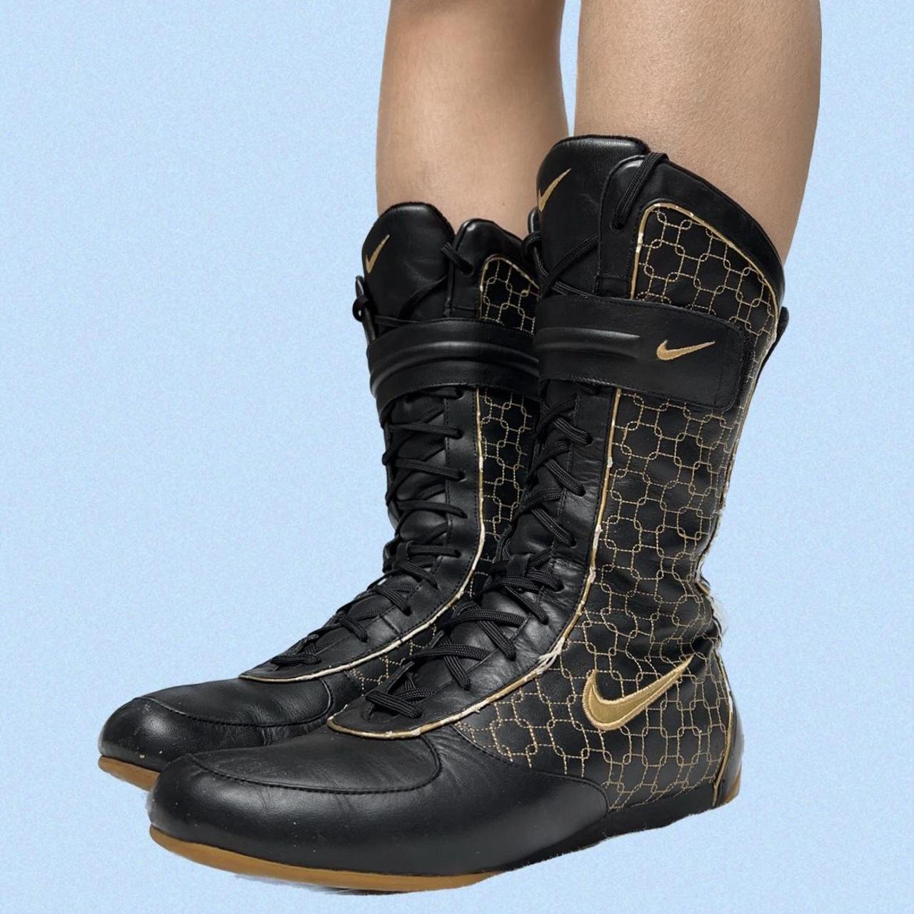 nike boots black and gold