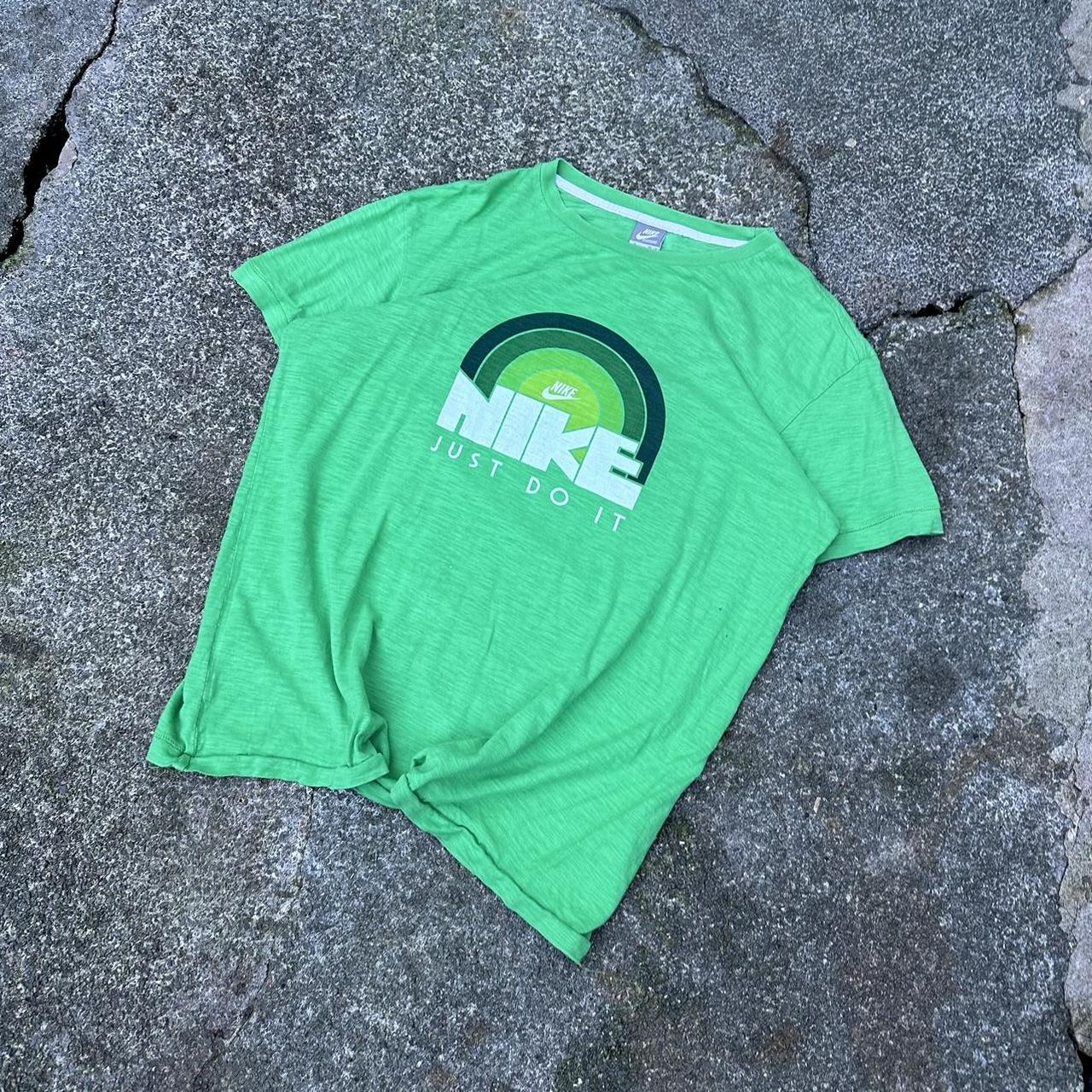 lime green and orange nike shirt