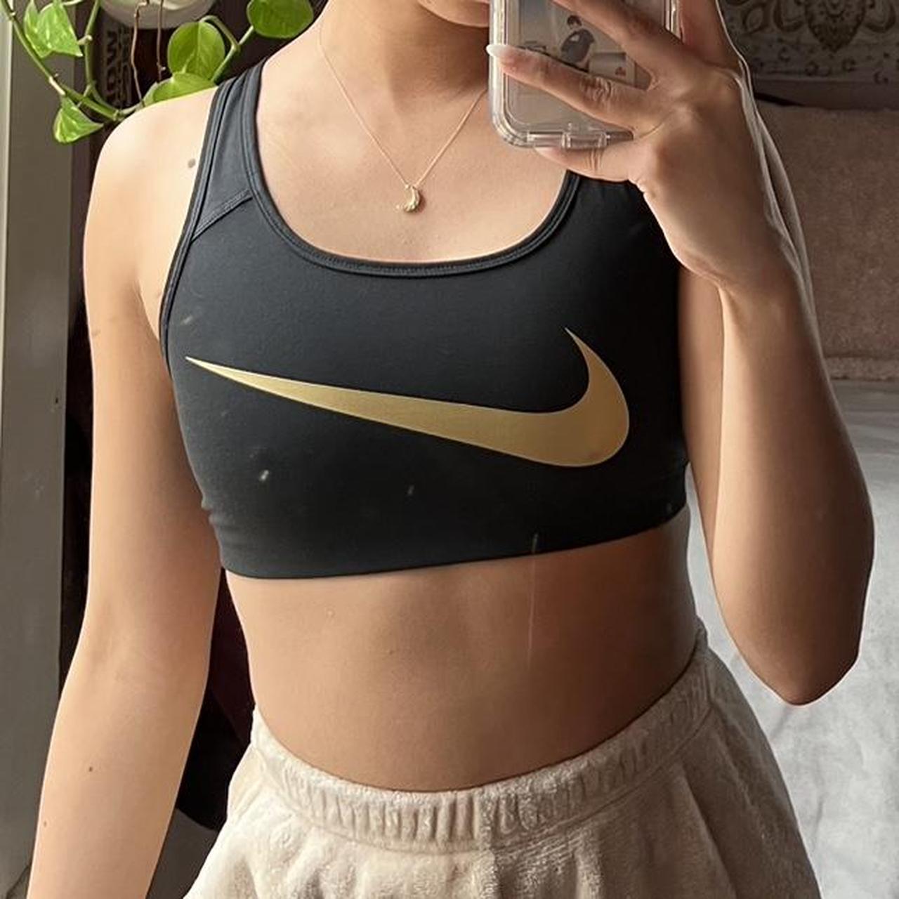 Nike Dri Fit Black and Gold Swoosh Sports Bra Size - Depop