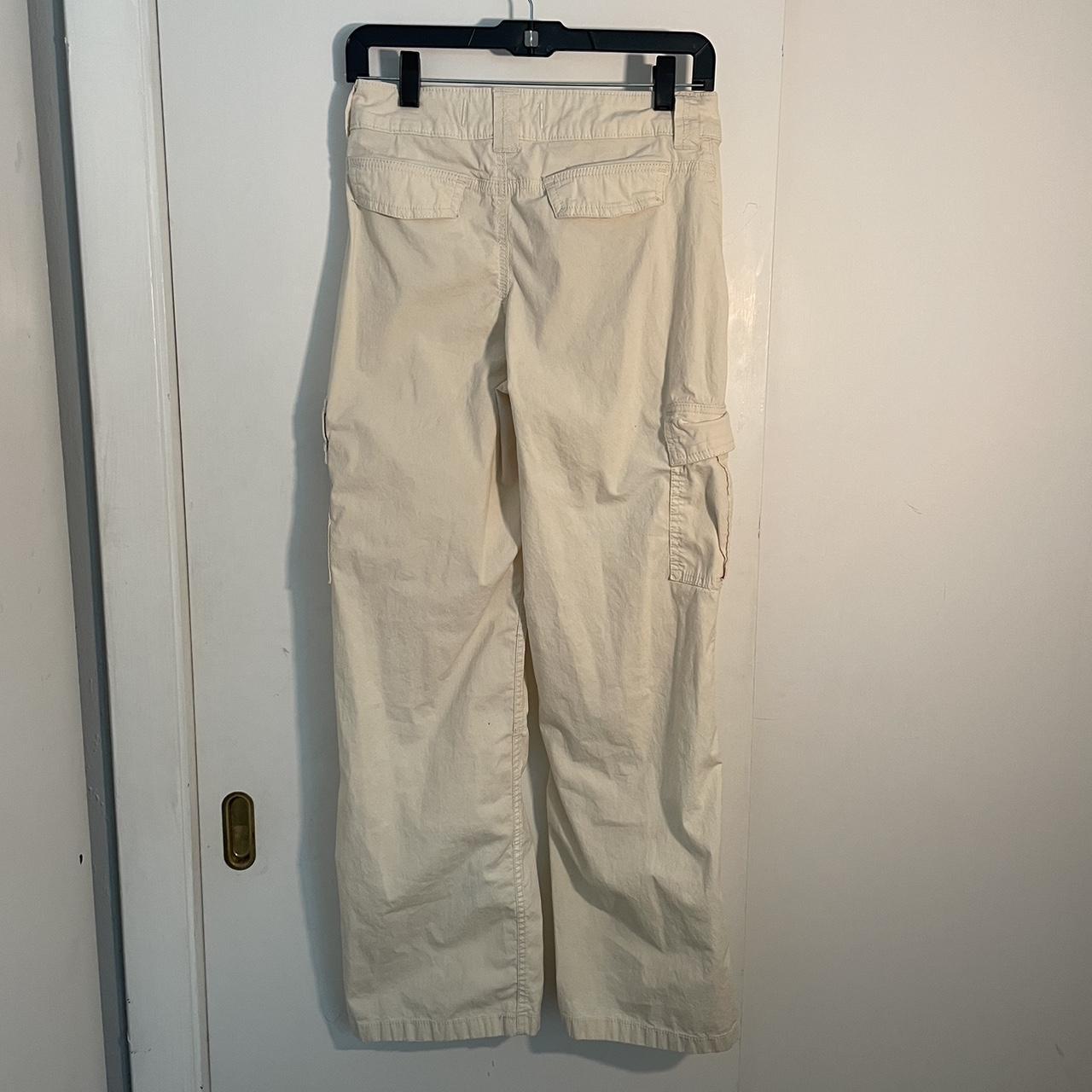 cream color hollister cargo pants large feel free - Depop