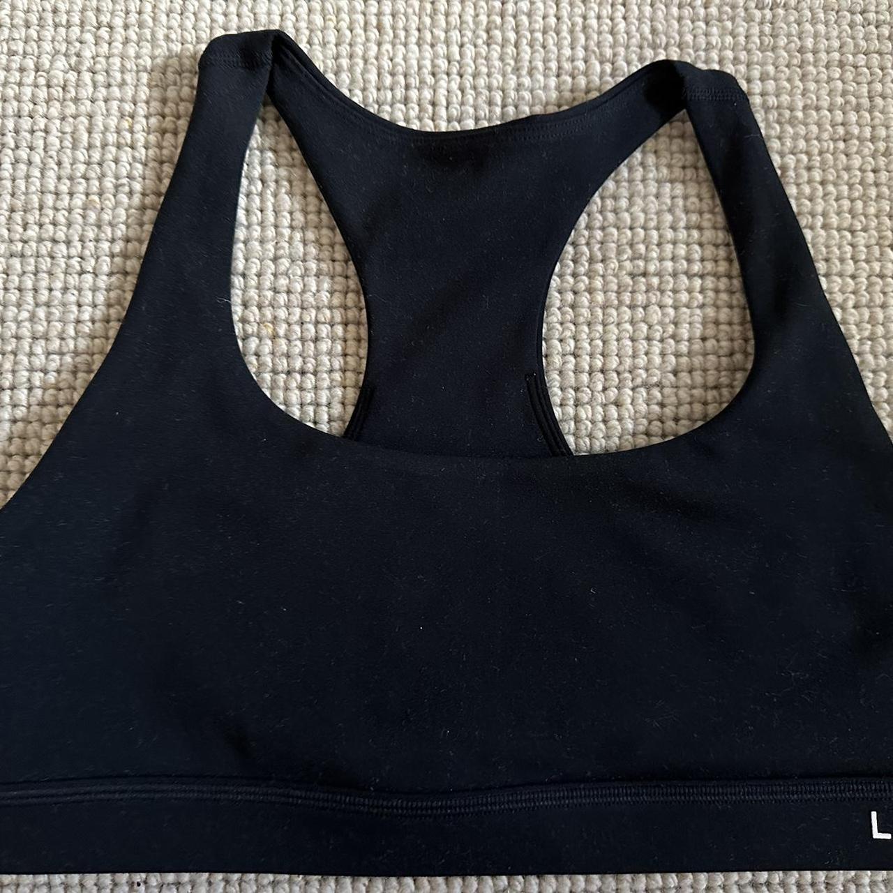 Black LSKD sports bra. Moderate support, perfect for... - Depop