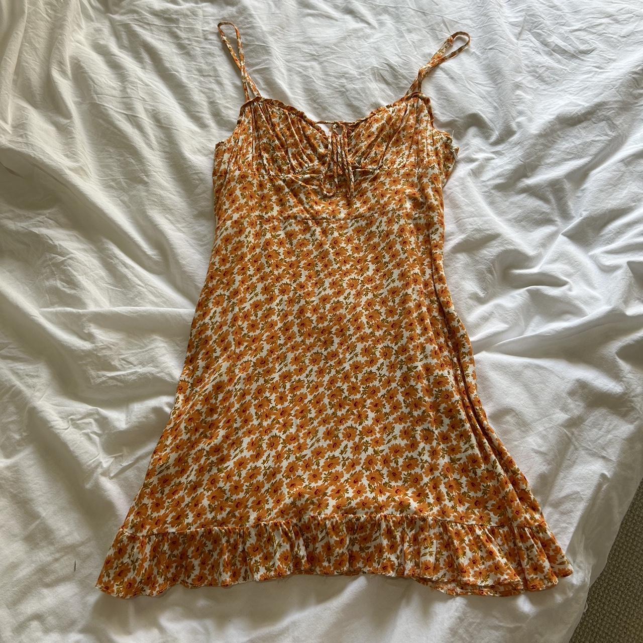 Orange floral princess polly dress in a size 8 - Depop