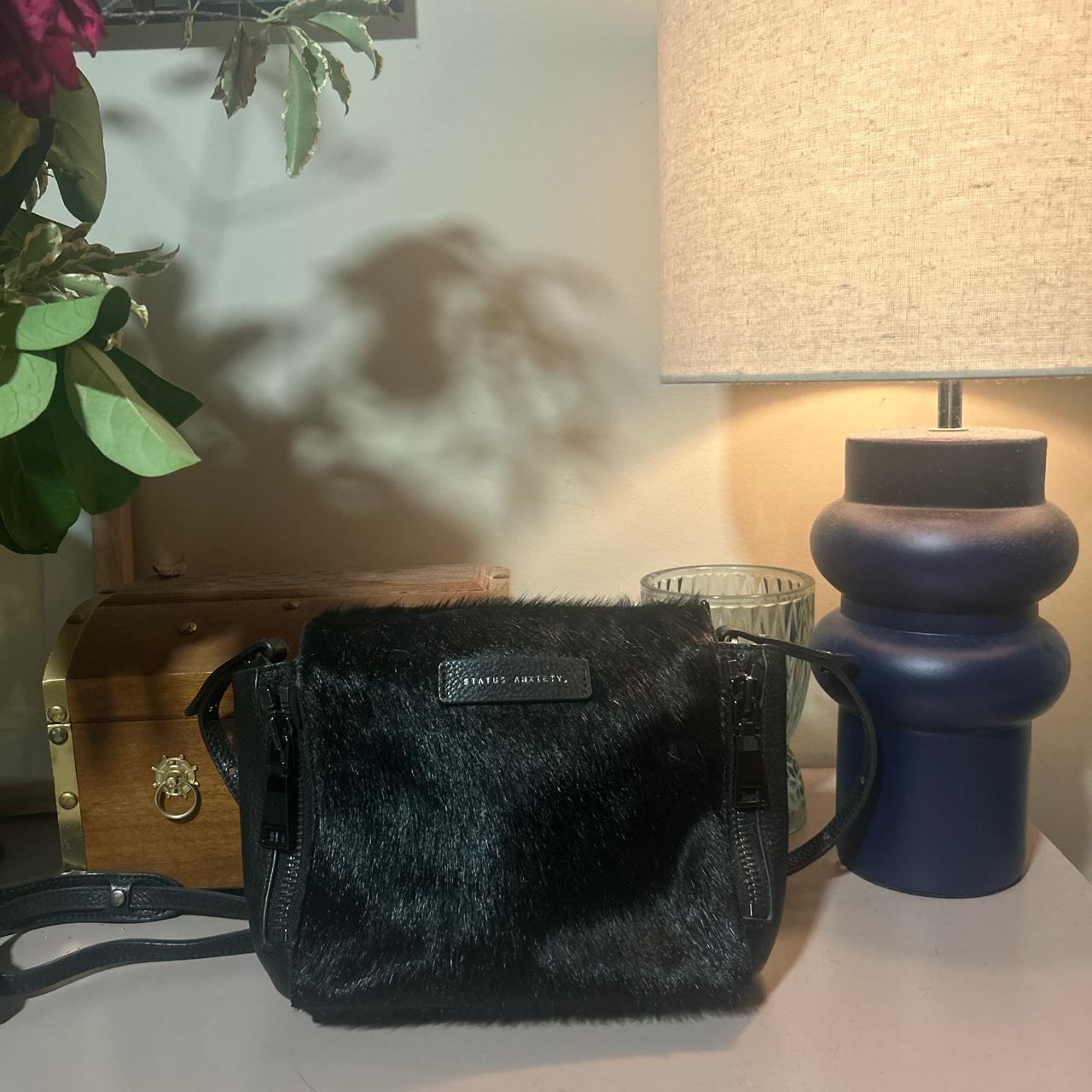 Status Anxiety crossbody bag Slight discolouring... Depop