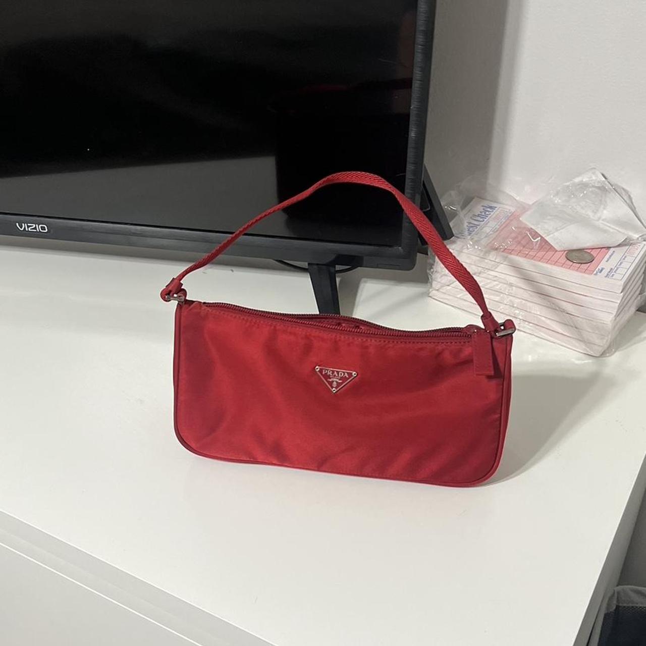 Prada Cleo brushed leather mini bag in scarlet red - Depop