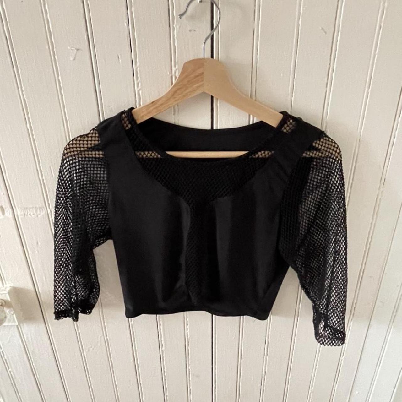 Cropped mesh top. Synthetic material. No brand or... - Depop