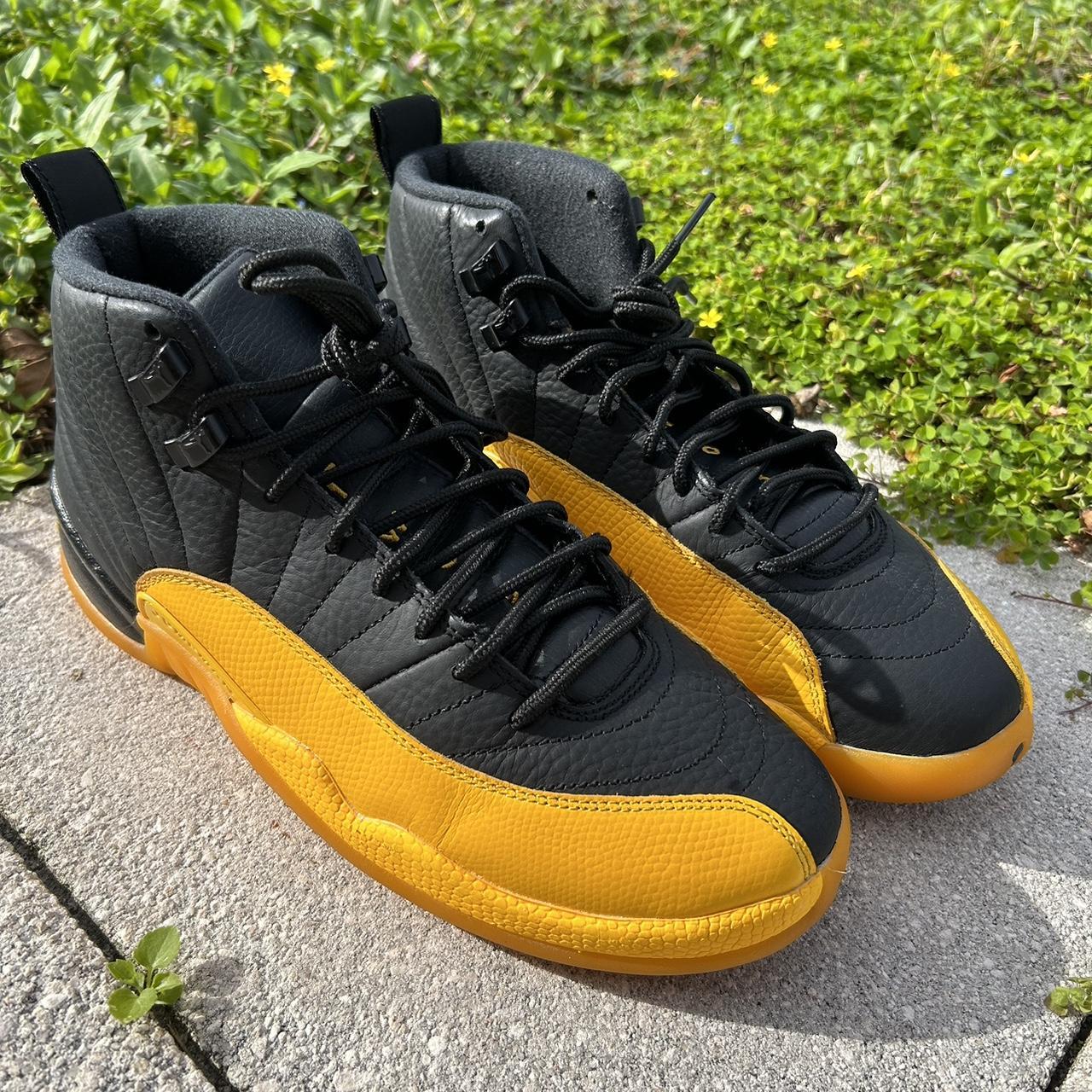 Black and gold jordans best sale 12 mens