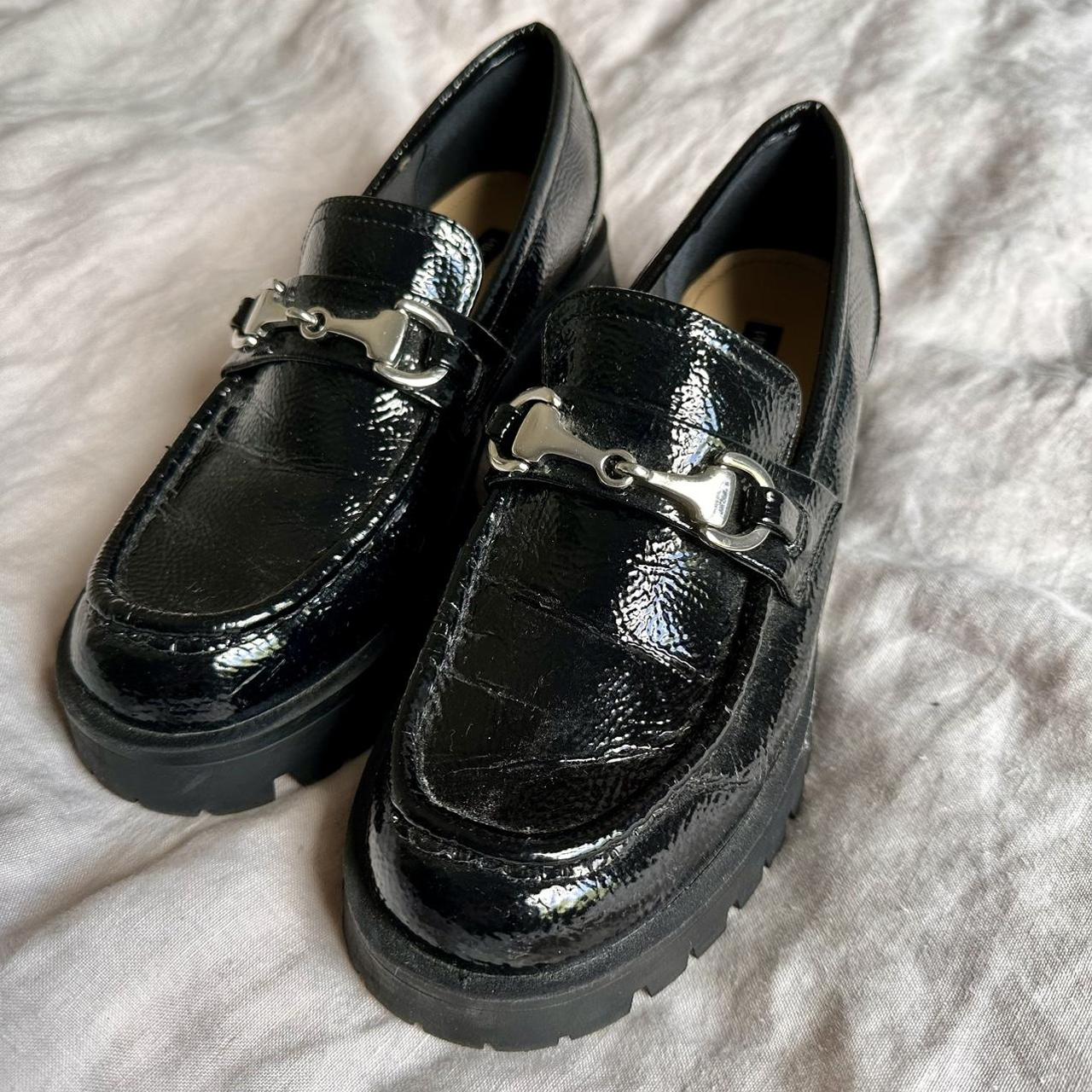 Black loafers best sale with silver buckle