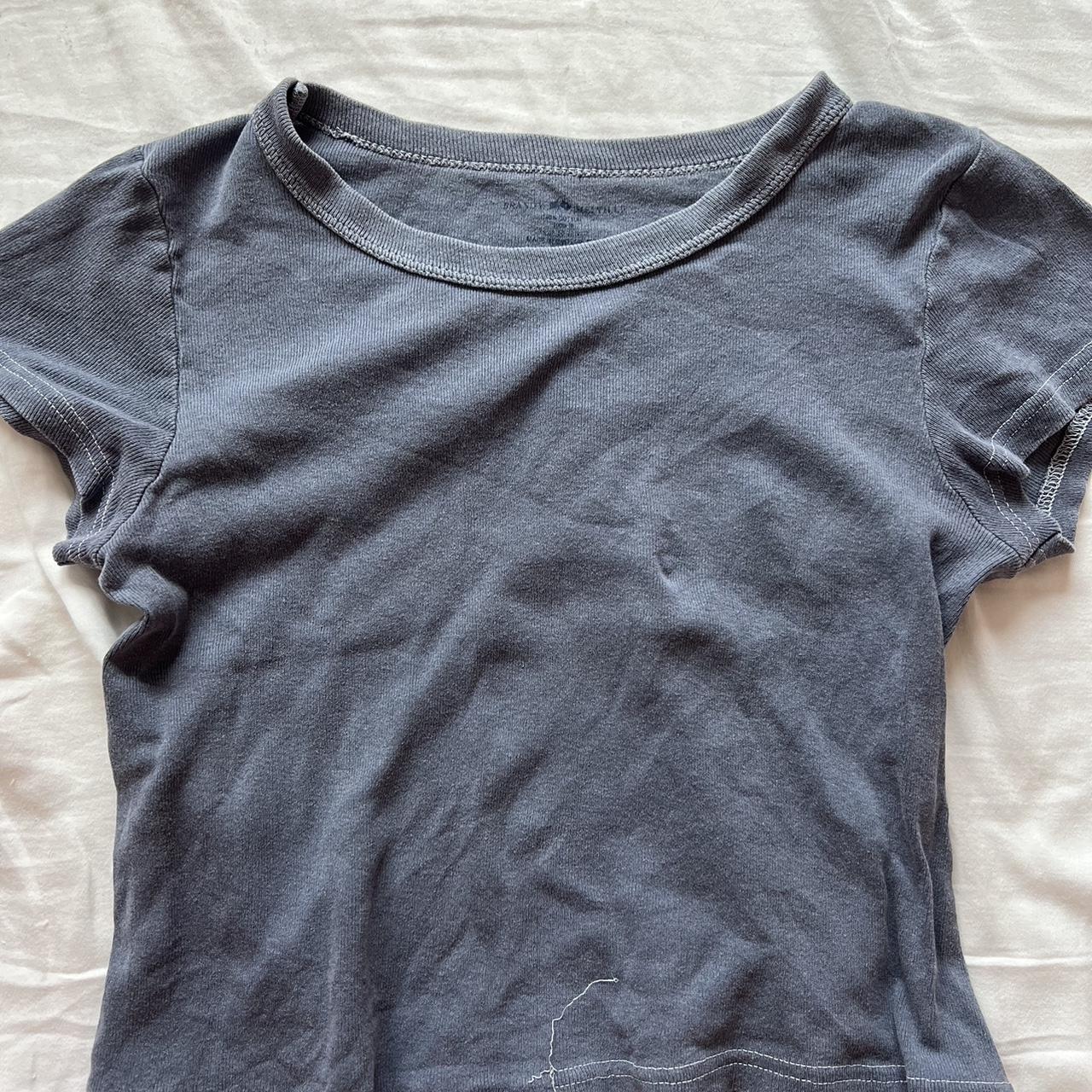 Brandy baby tee, ripped seem towards bottom. Not too... - Depop