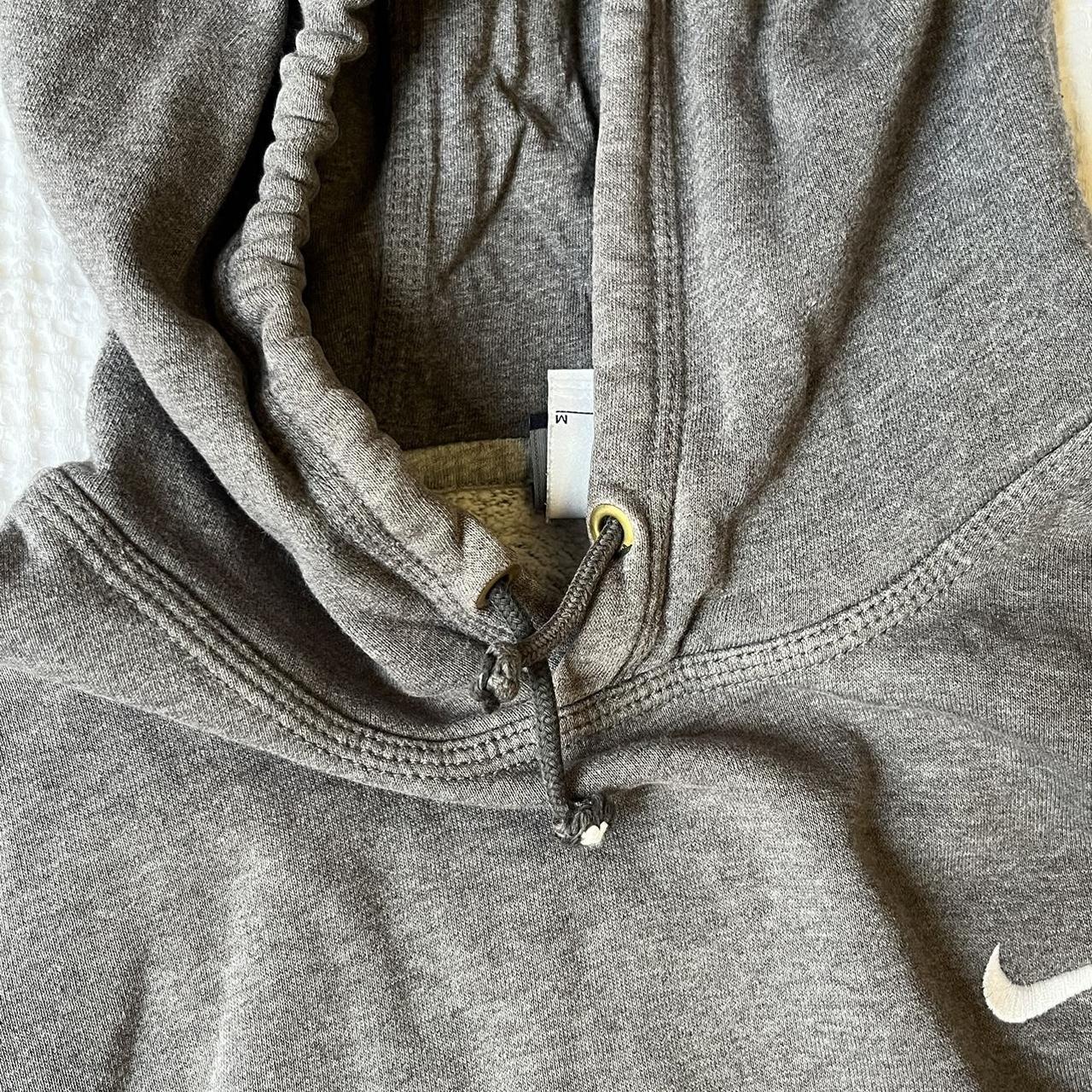 dark grey nike hoodie size M, pre loved (worn in)... - Depop