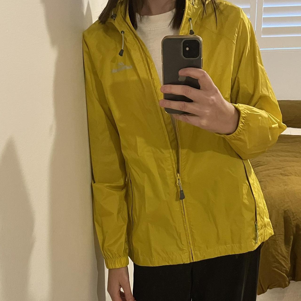 Yellow Kathmandu rain jacket. Kathmandu size says 12... Depop
