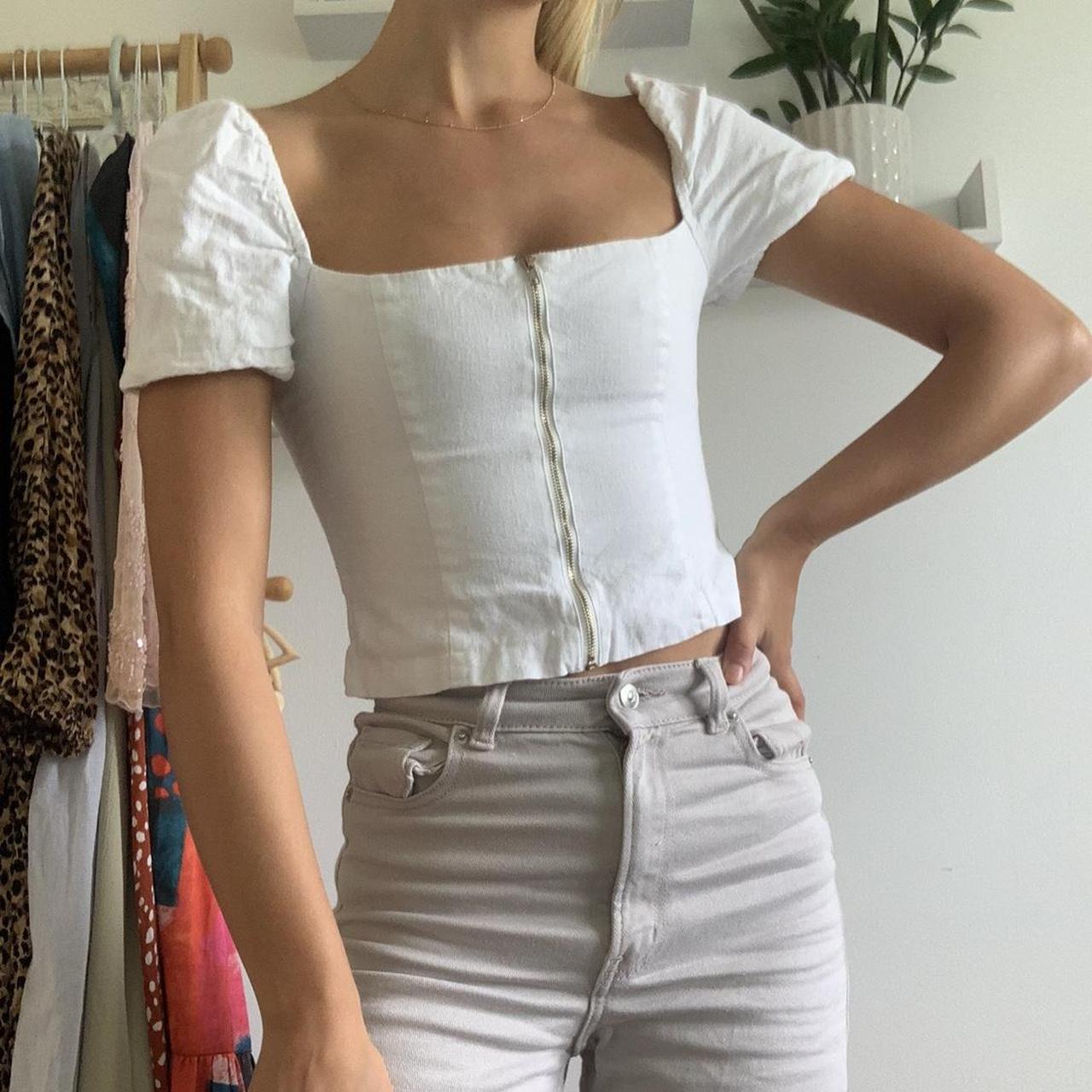 Gorgeous white zip-up top, corset-style with... - Depop