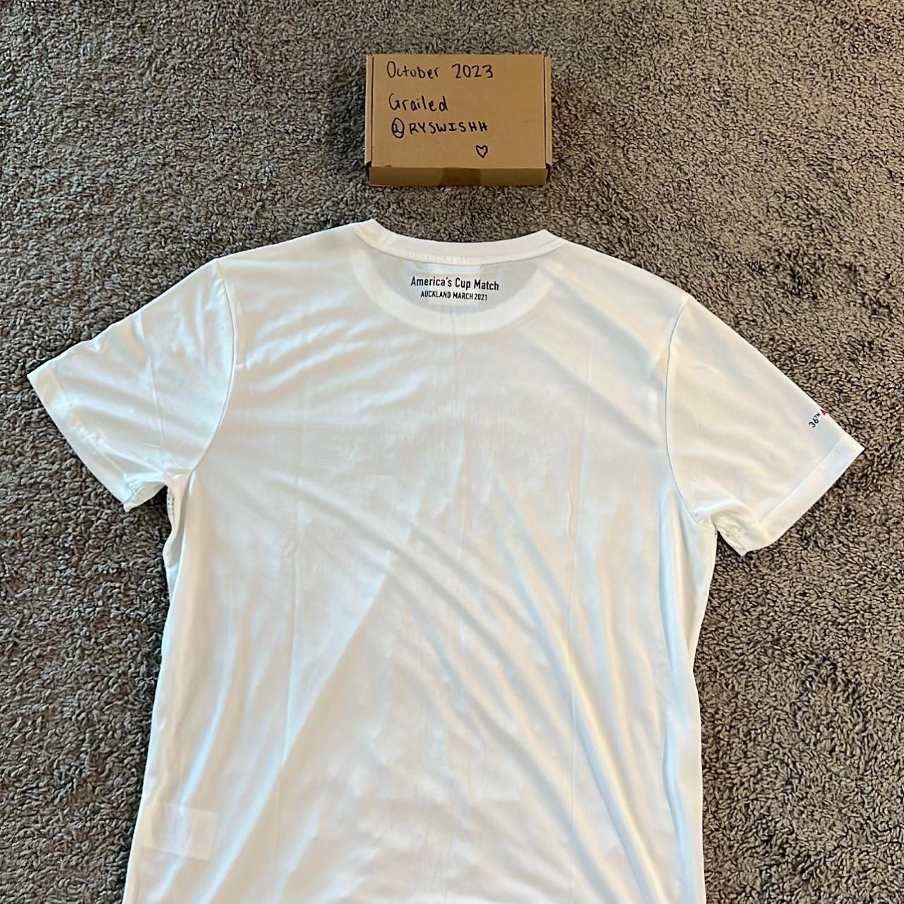 Pictured is a Prada America's Cup dry-fit Depop