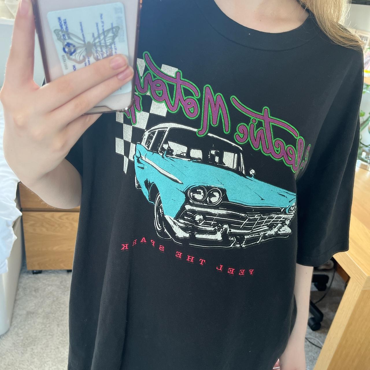 Black Brandy Melville oversized tee with car... Depop