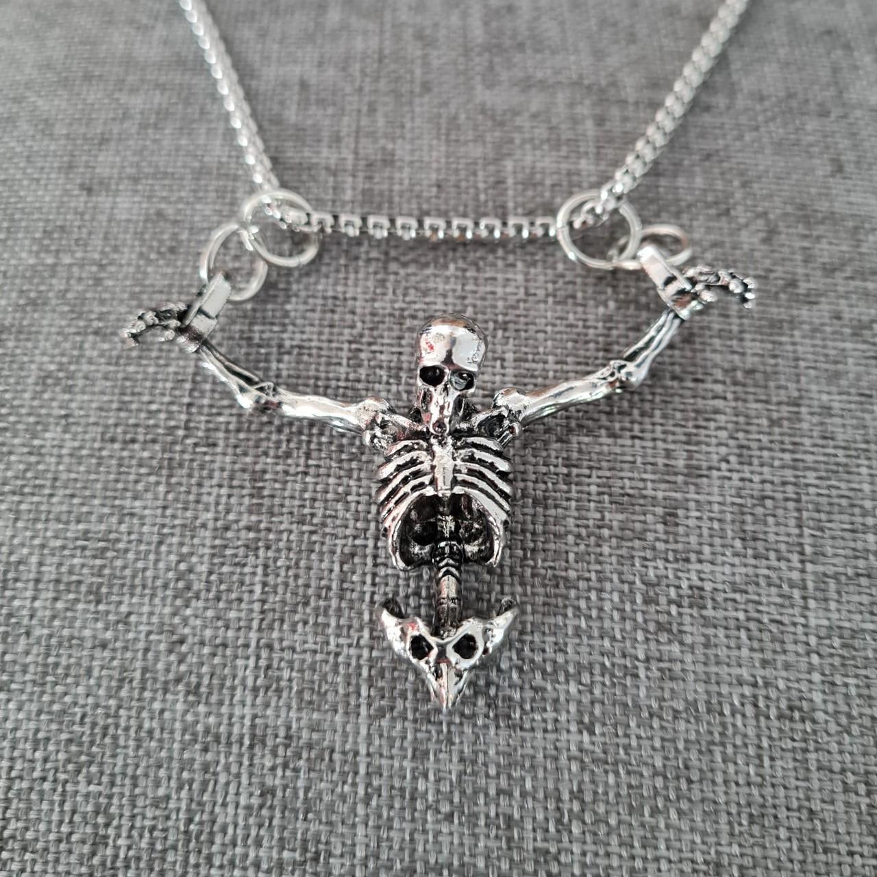 Chained skeleton necklace. Fantastic design both at... - Depop