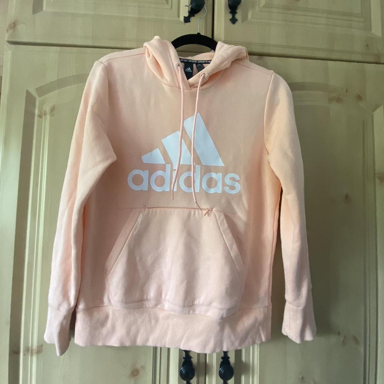 Coral adidas hoodie with a handy pocket for your. Depop