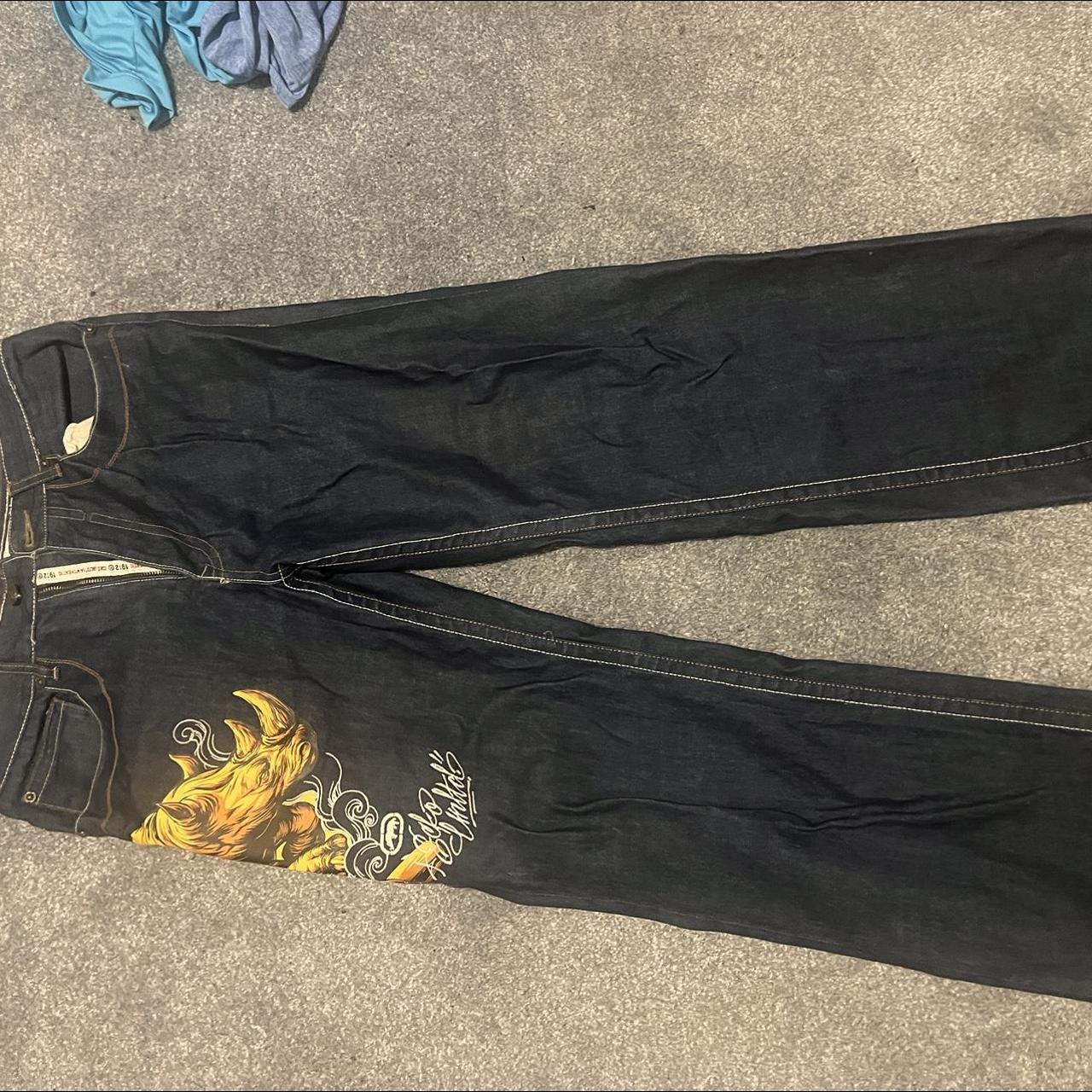 Vintage ECKO jeans with rhino print on right... - Depop