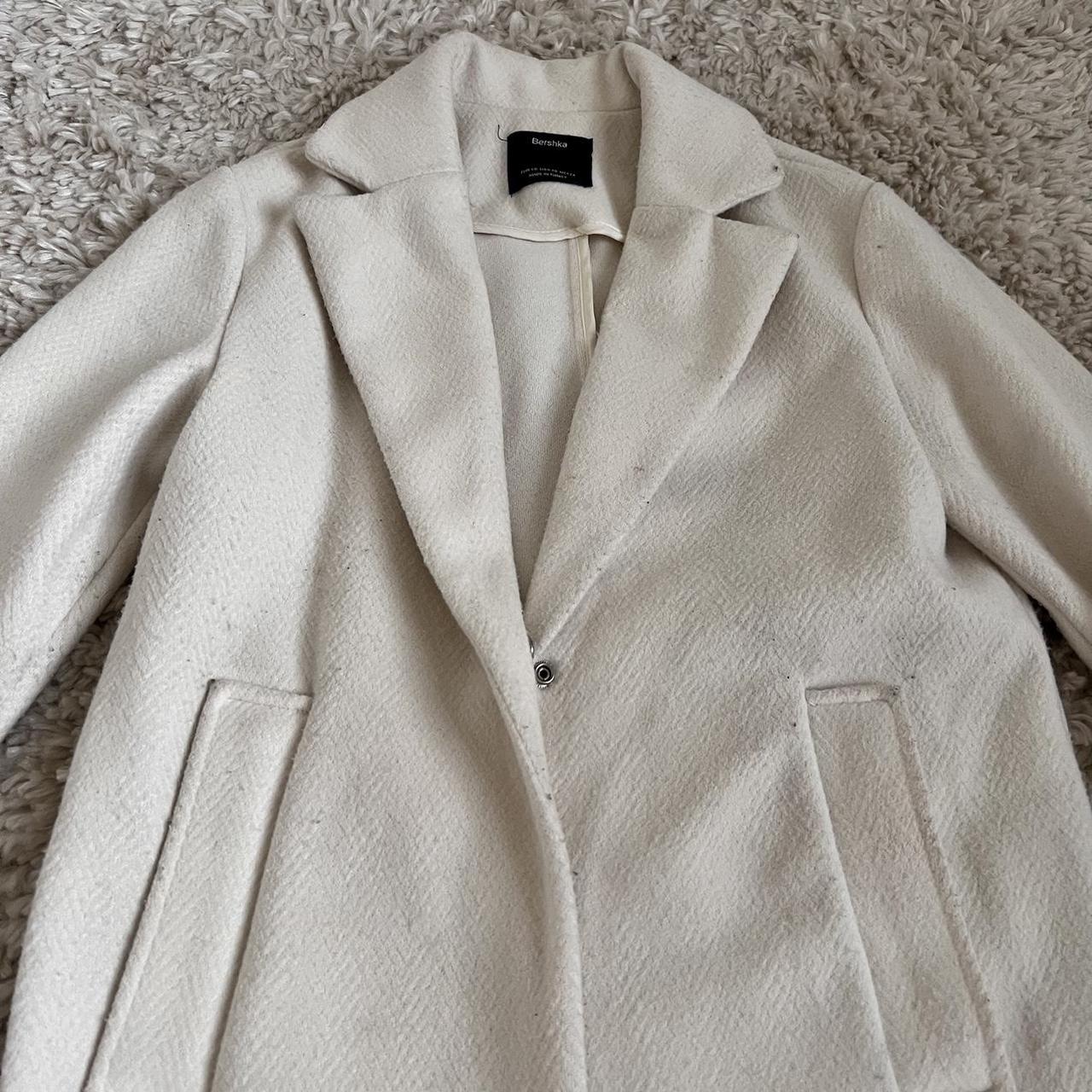 Thrifted this white Bershka coat. Slight wear which... - Depop