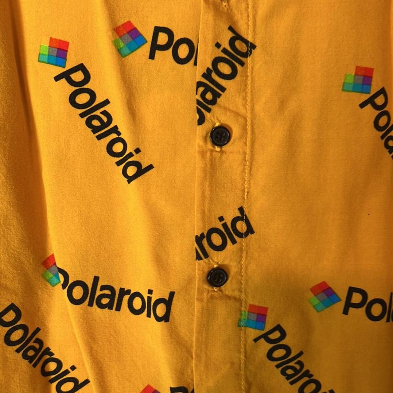 polaroid yellow shirt