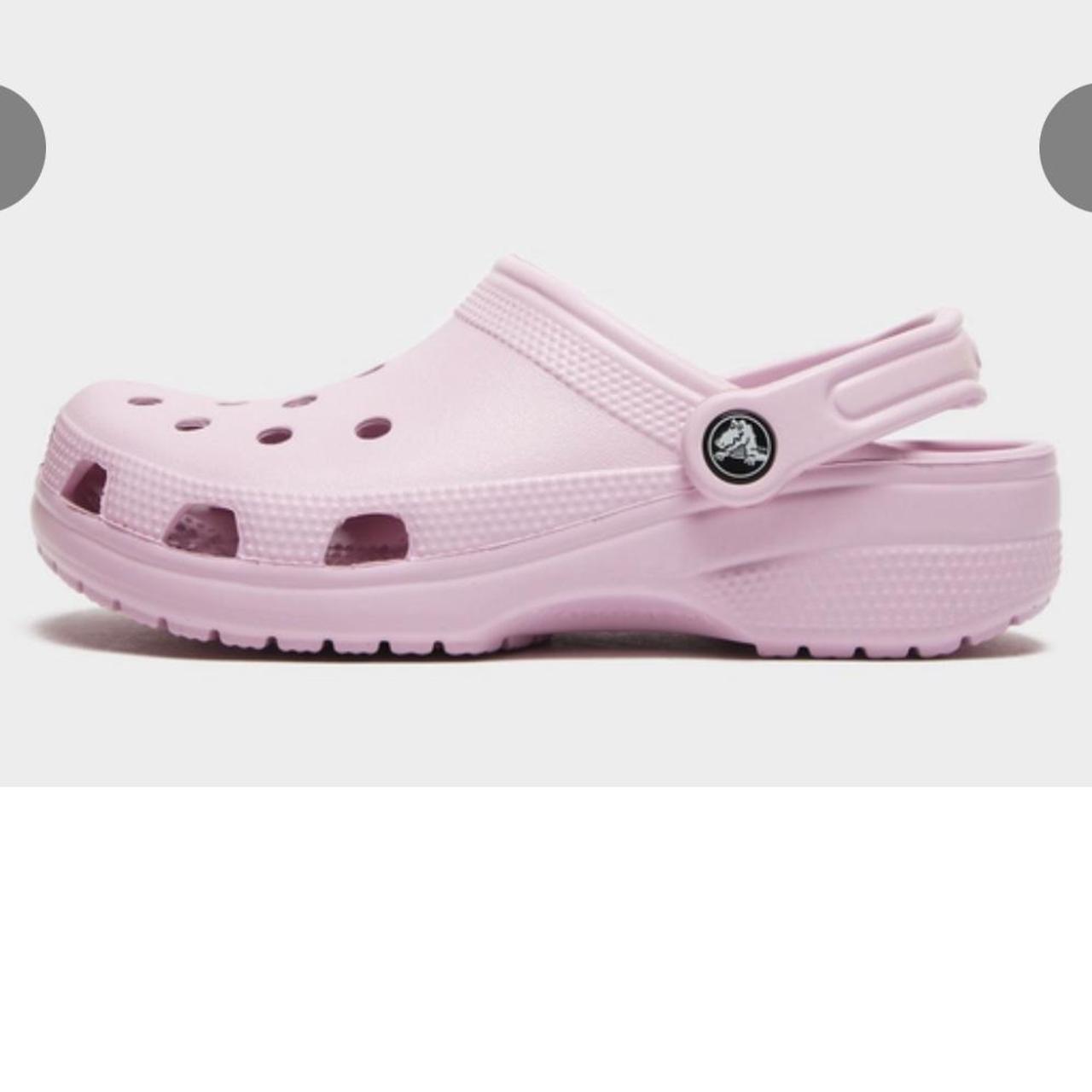 light pink crocs love these they are so cute for... - Depop