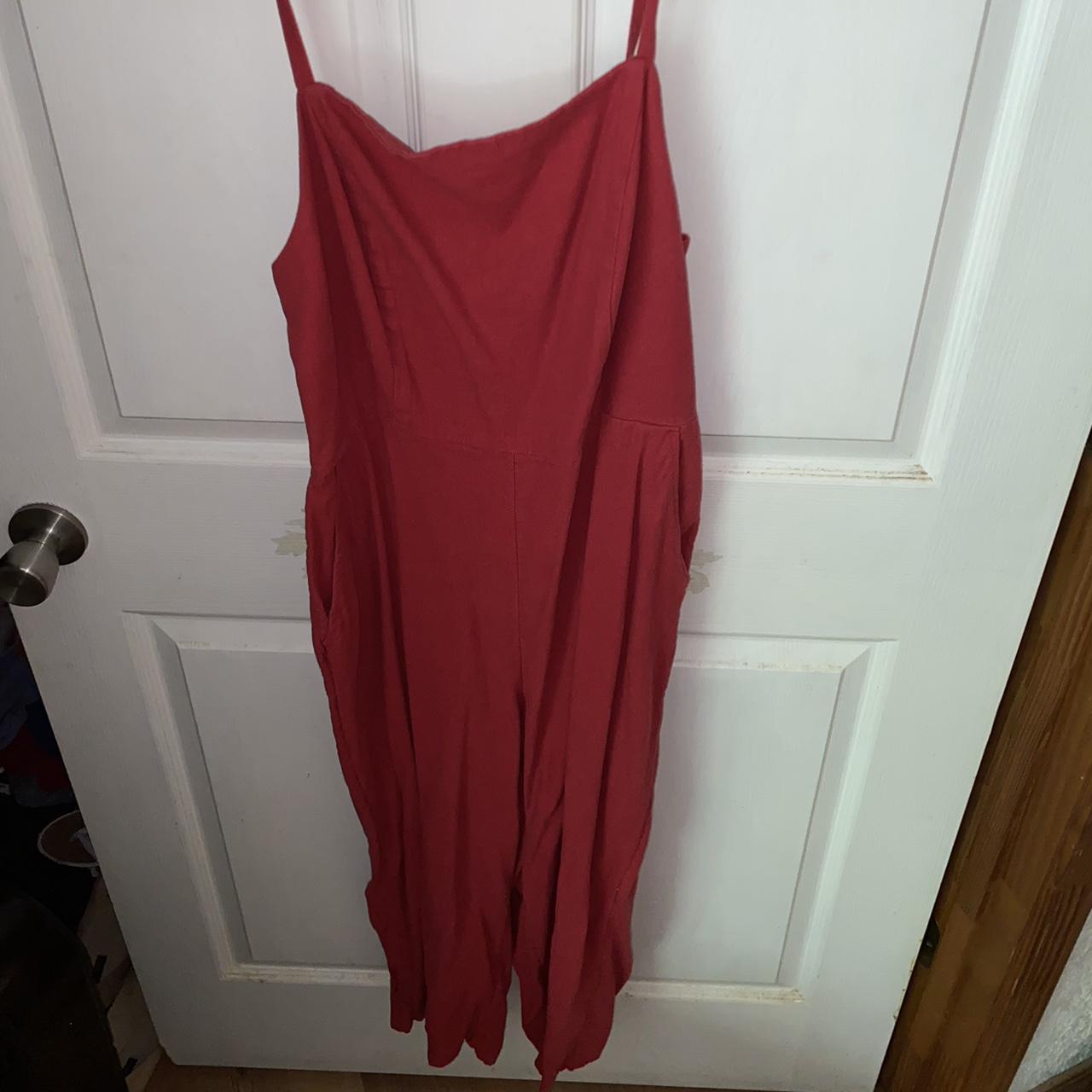 Red jumpsuit with pockets and adjustable straps