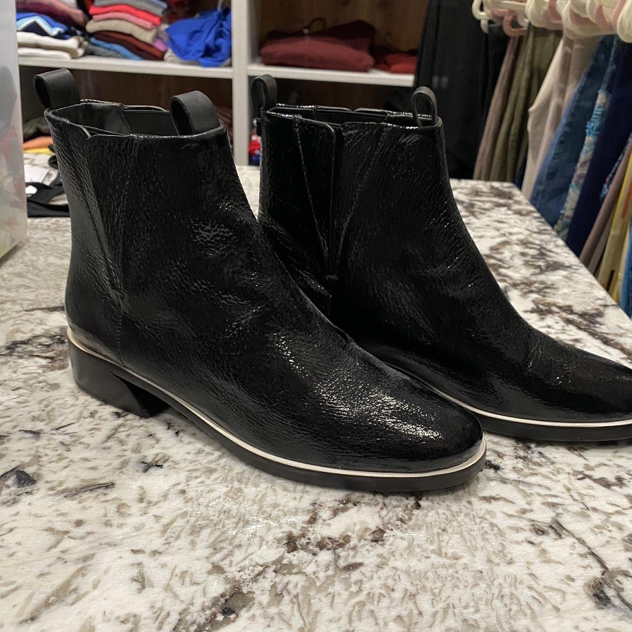 Black faux leather boots size 9 like new - worn... - Depop