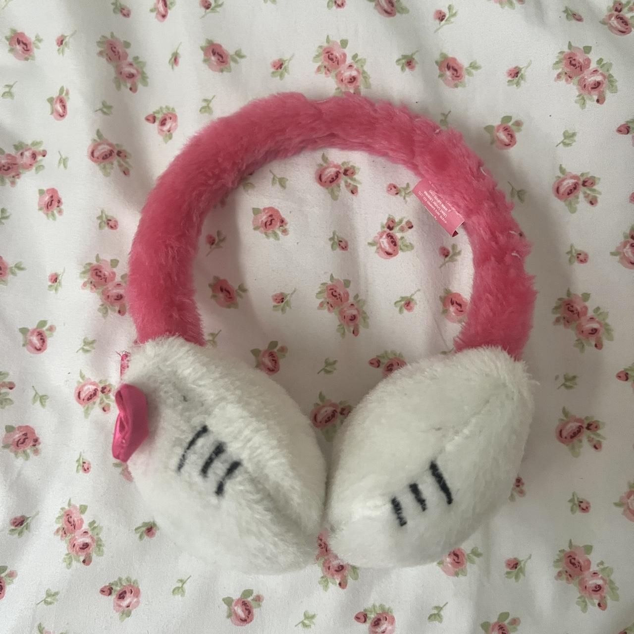 Cute hello kitty earmuffs ! They’re sized for both... Depop