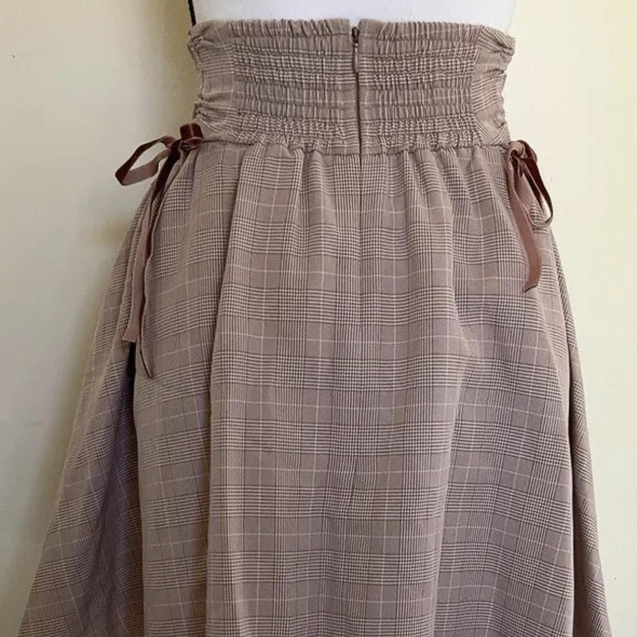 This Ank Rouge plaid skirt is a stylish addition to... - Depop