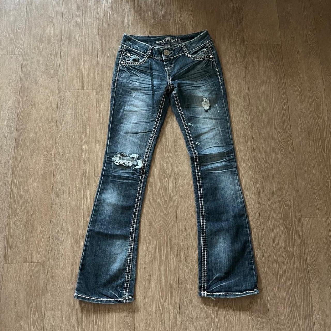 Almost Famous y2k flared low rise jeans with rip at... - Depop