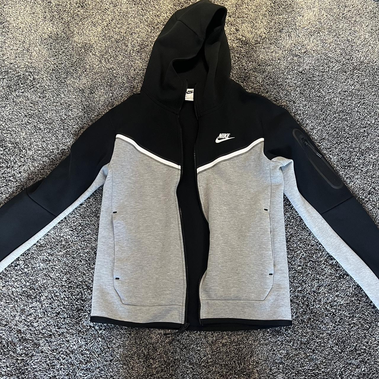 Small black and grey nike tech jacket The second... - Depop