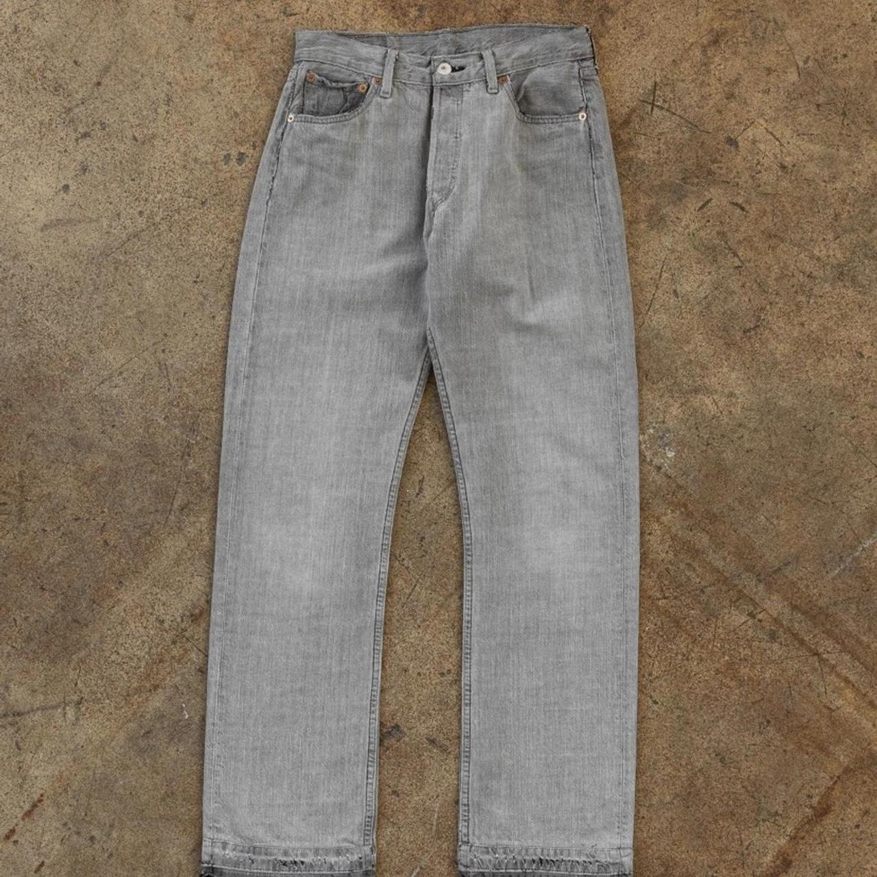 faded distressed grey washed levis. Fits as tagged... - Depop