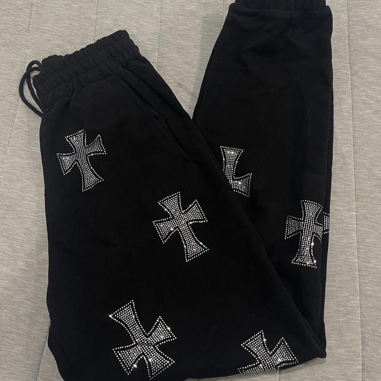 unknown london rinestone cross pants. size s. never...