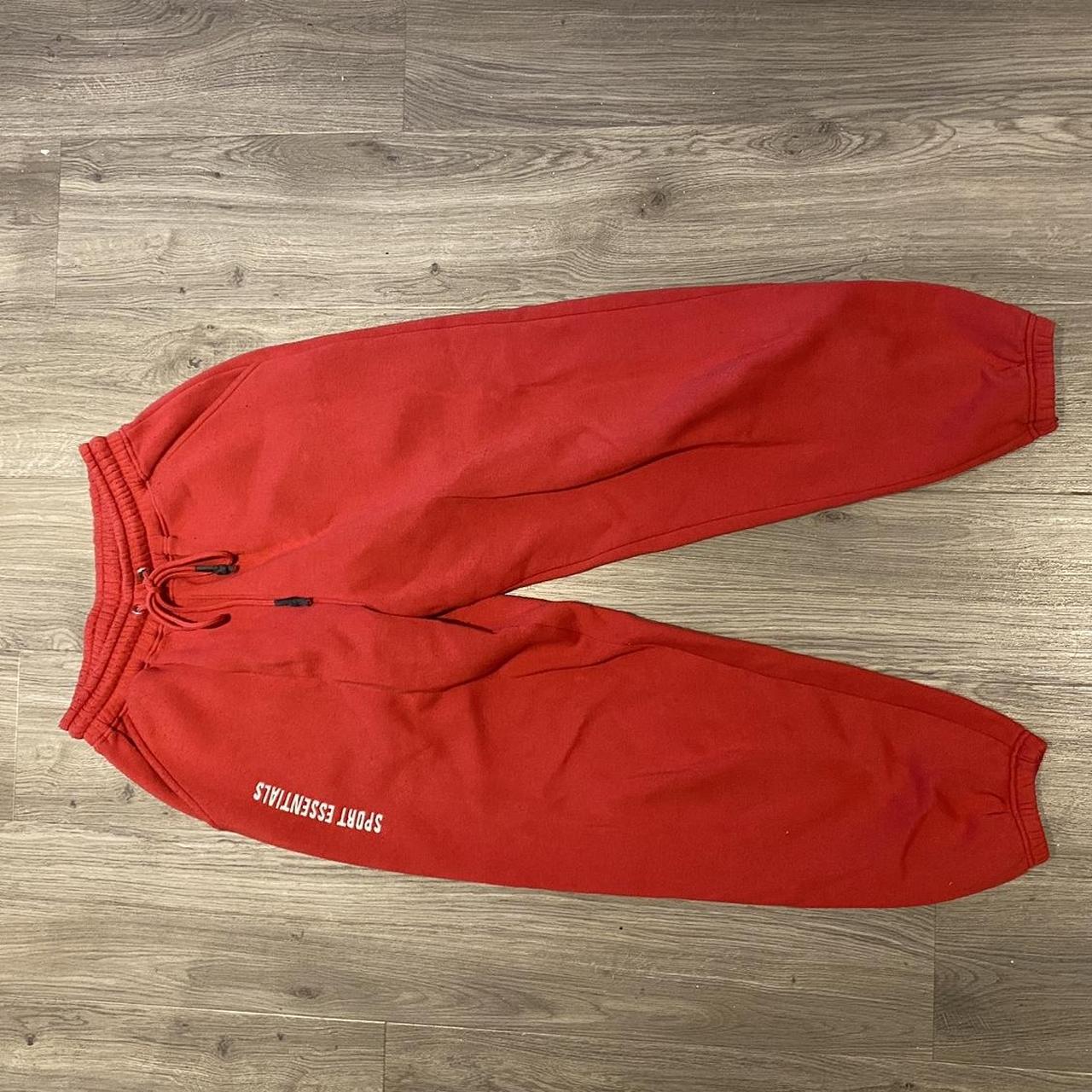 red oversized joggers have pockets and embroidered... - Depop