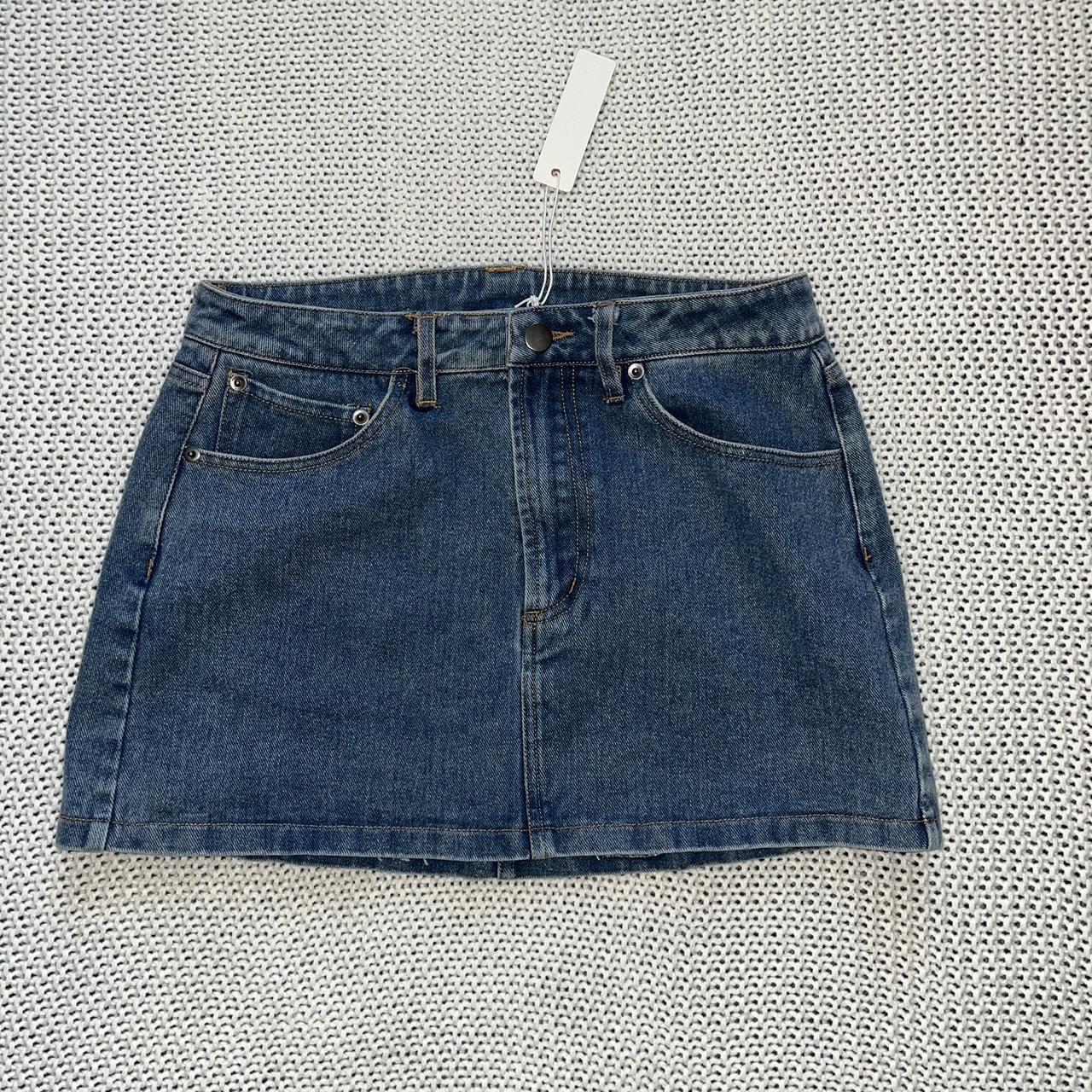 dark wash mini denim skirt. nwt. brand is in photos,... - Depop